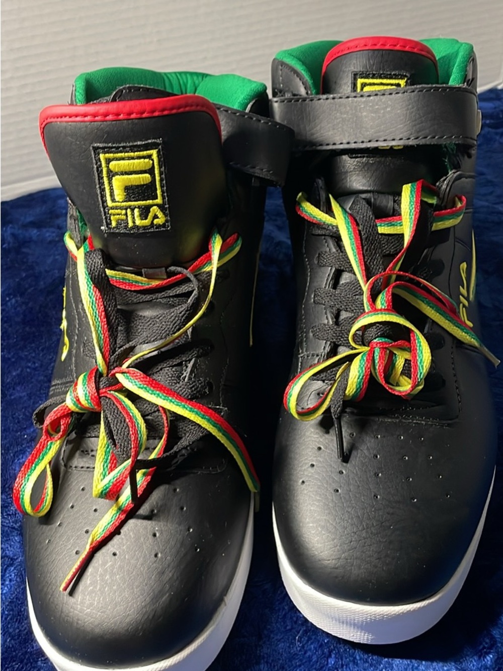 Fila mens Vulc 13 High-Top Sneakers size 13 with Red, Green and Yellow Accents.